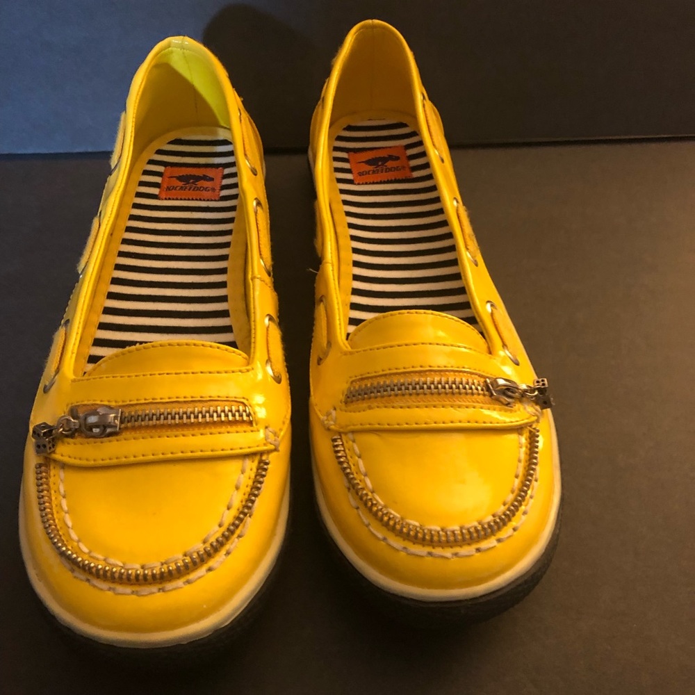 Yellow and black casual shoe by Rocket Dog.